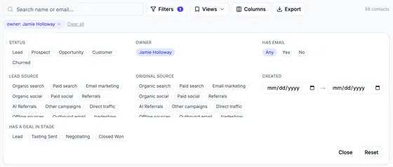 The contacts filter panel with the owner filter Jamie Holloway applied: status, owner, has email, lead source, original source, created date and has a deal in stage.