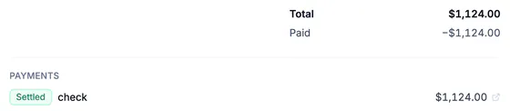 Totals and payments: total $1,124.00, paid −$1,124.00, and a settled check payment of $1,124.00.