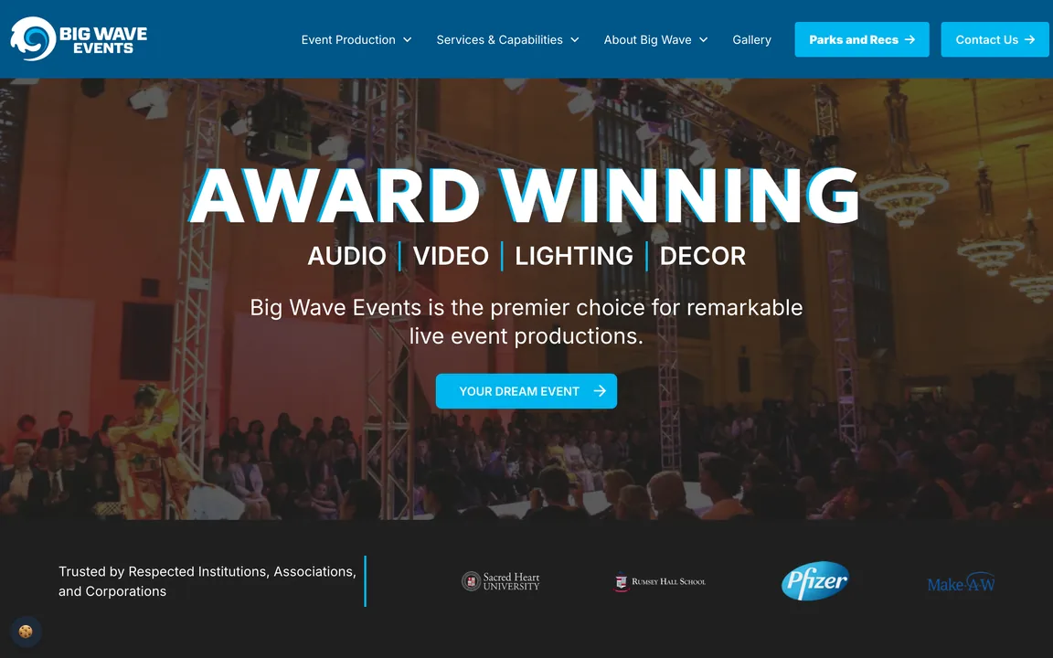 Big Wave Events homepage with the headline Award Winning and the words Audio, Video, Lighting, Decor over a photo of a staged event.