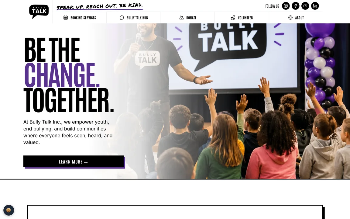 Homepage hero reading Be the Change. Together., with a speaker on stage and students raising their hands.