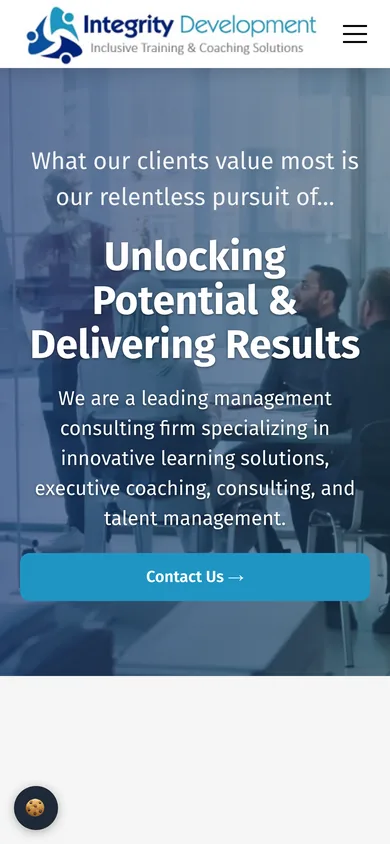Mobile view of the Integrity Development homepage with the logo, menu button, headline and a full-width Contact Us button.
