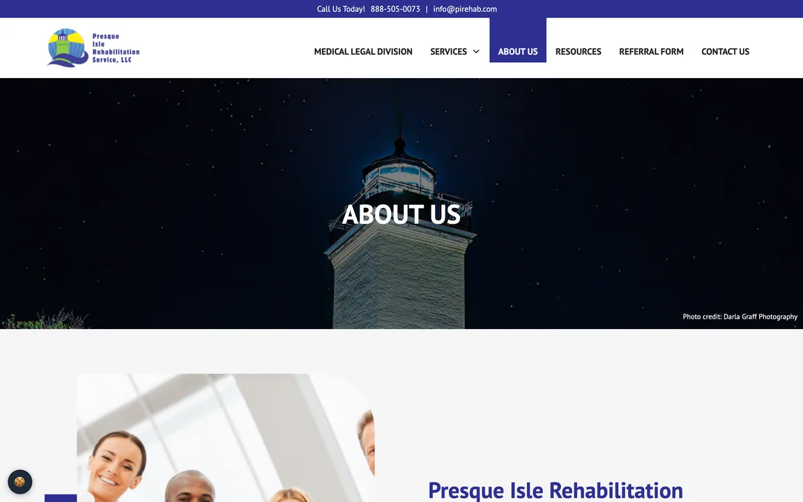 About Us page with the lighthouse banner and the start of the company introduction.