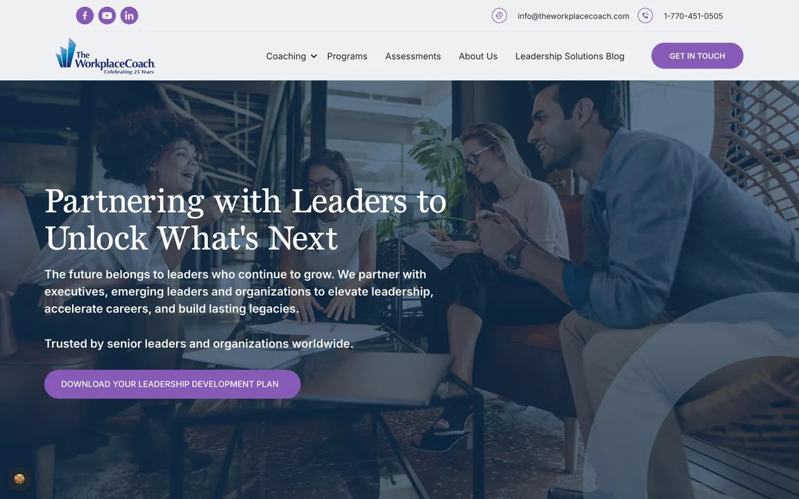 Homepage hero reading Partnering with Leaders to Unlock What's Next over a photo of colleagues talking, with a Download Your Leadership Development Plan button.