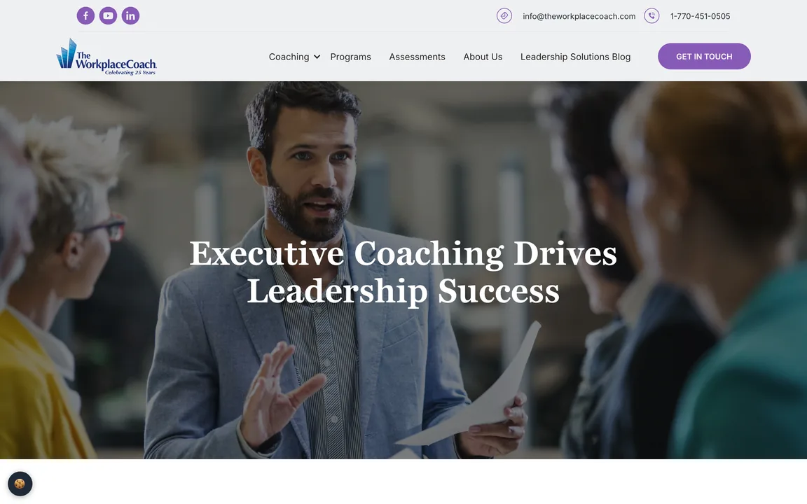Page headed Executive Coaching Drives Leadership Success over a photo of a man talking with colleagues.