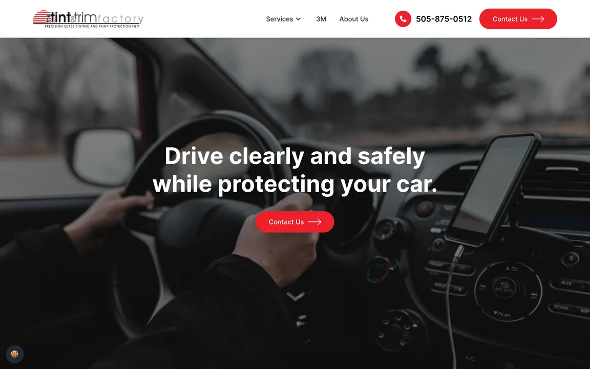 Automotive page with the headline Drive clearly and safely while protecting your car over a photo of a driver's hands on a steering wheel.